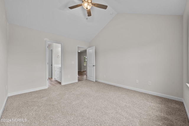 200 Slater Way, Jacksonville, NC 28540 - unfurnished bedroom featuring light colored carpet, baseboards, ensuite bathroom, high vaulted ceiling, and a ceiling fan