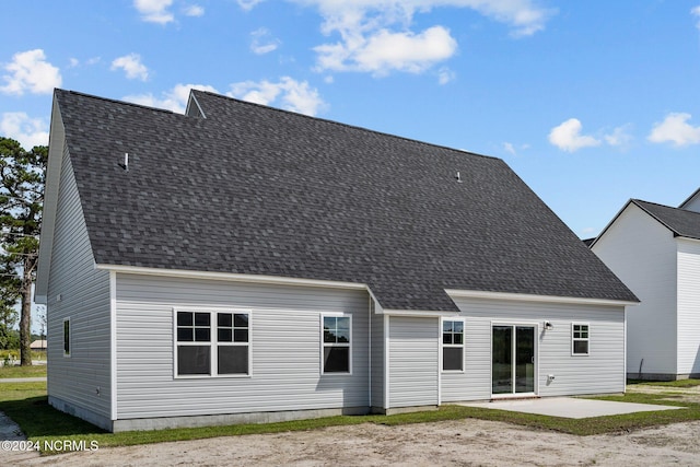 rear view of house featuring a patio