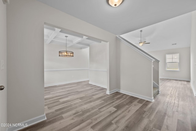 200 Slater Way, Jacksonville, NC 28540 - basement with wood finished floors, baseboards, a ceiling fan, and stairway