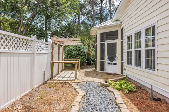 view of yard with fence, a pergola, and a patio