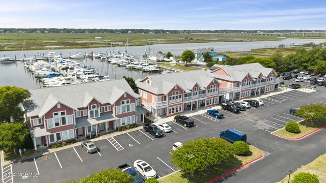 drone / aerial view featuring a water view