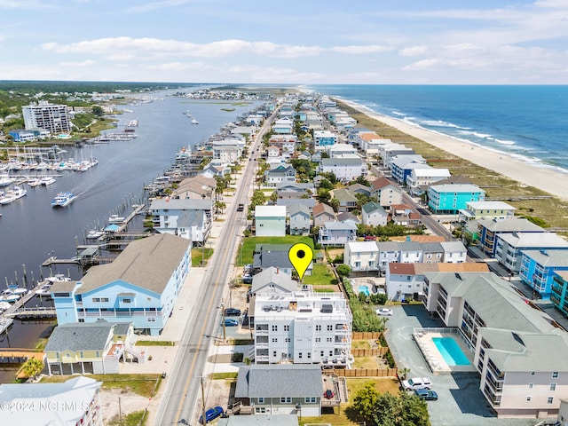 aerial view with a beach view and a water view