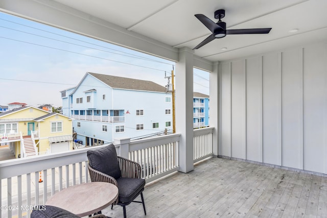 wooden terrace with ceiling fan