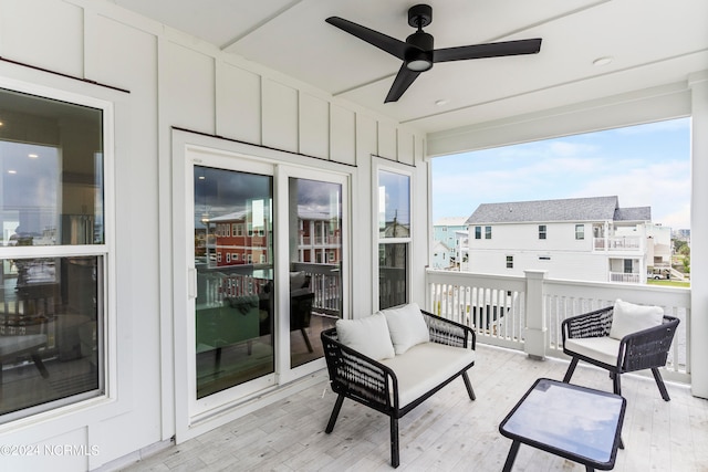 exterior space featuring ceiling fan