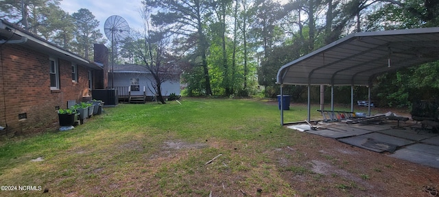 view of yard featuring a carport