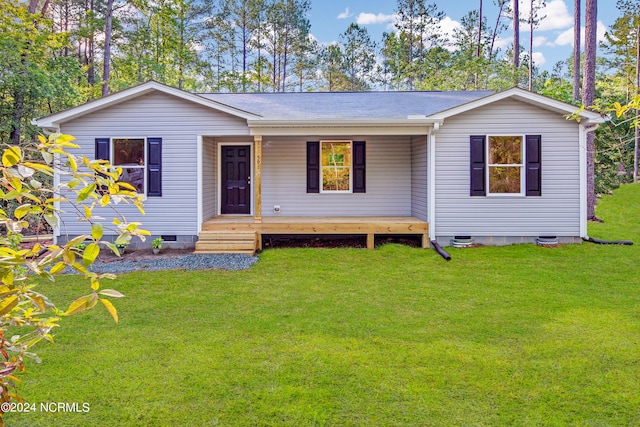 ranch-style home with a front lawn