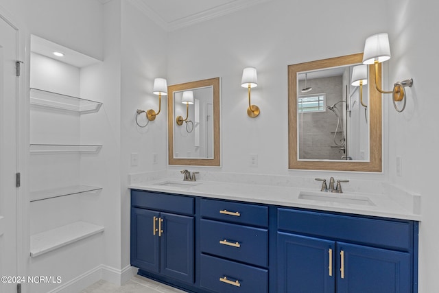 bathroom with double vanity, tile patterned floors, and ornamental molding