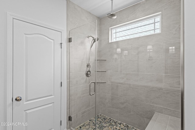 bathroom with an enclosed shower