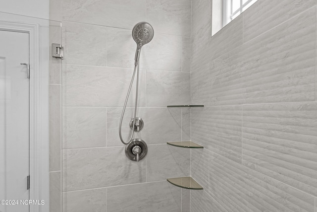 room details with a tile shower