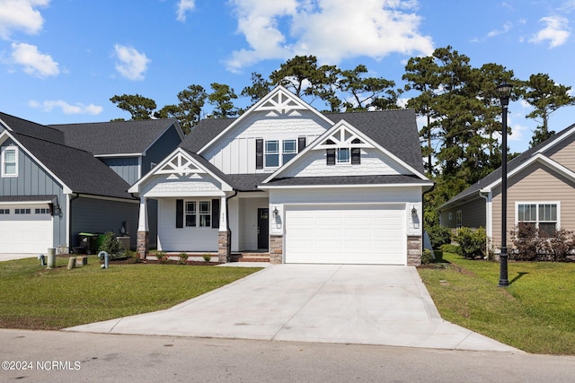 craftsman-style home featuring a garage and a front yard