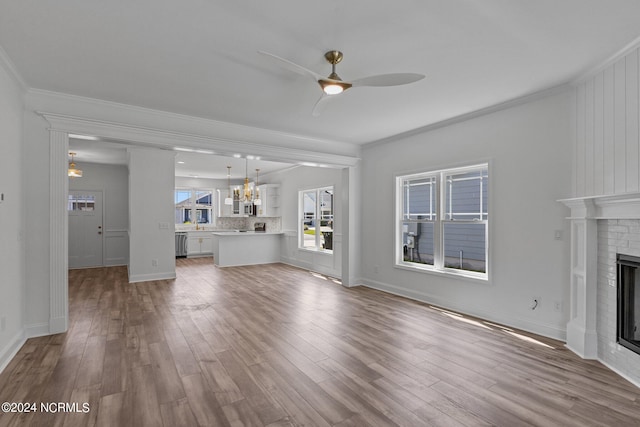 carpeted empty room featuring ornamental molding and ceiling fan