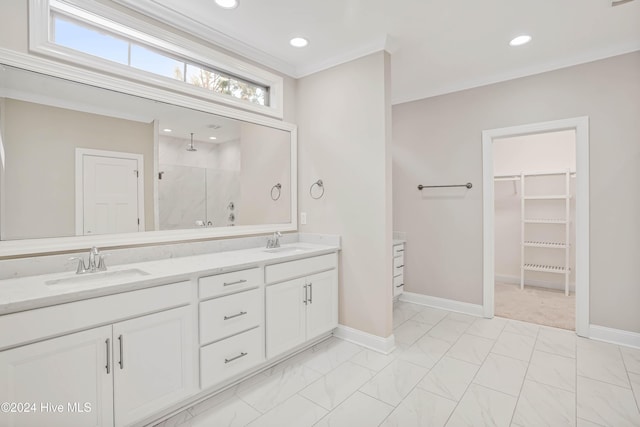 bathroom with vanity, a shower, and crown molding