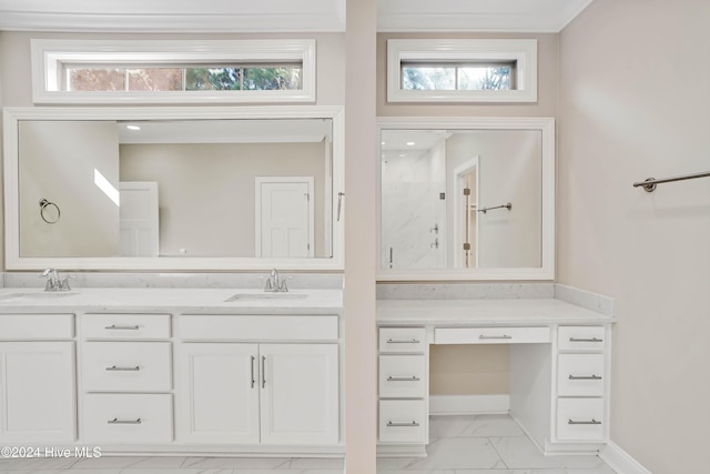 bathroom featuring a shower, vanity, and a wealth of natural light