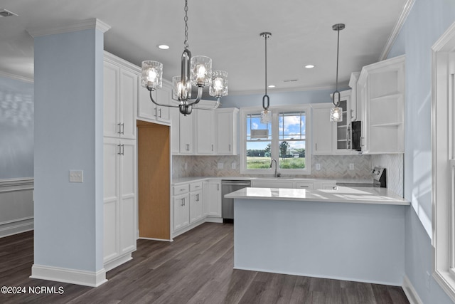 kitchen featuring white cabinetry, dark hardwood / wood-style flooring, pendant lighting, appliances with stainless steel finishes, and ornamental molding