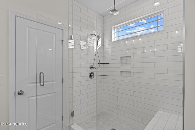 bathroom with an enclosed shower