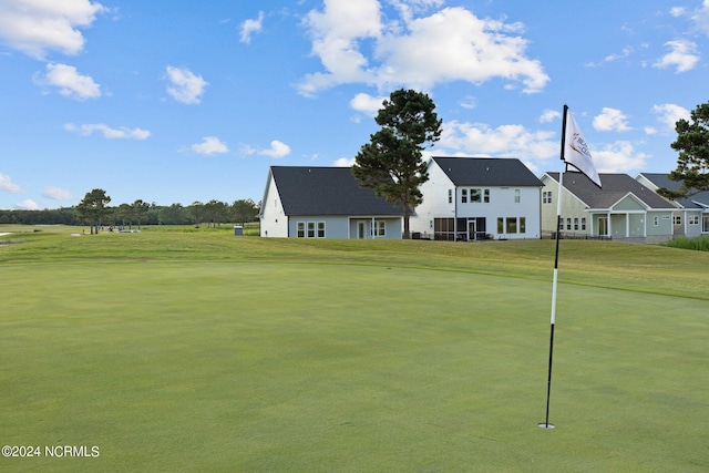 view of home's community with a lawn