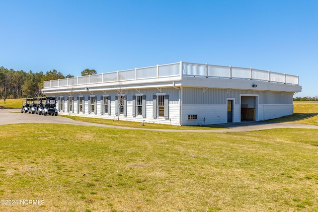 exterior space with a front lawn