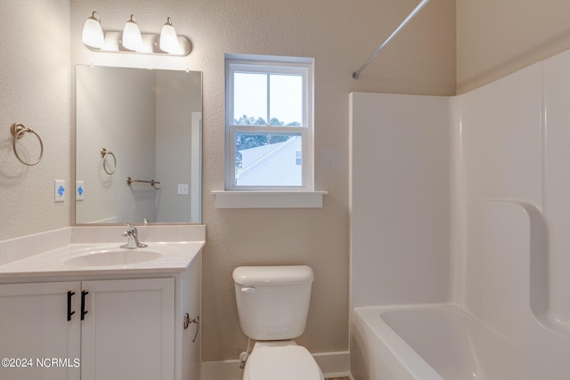 full bathroom with shower / washtub combination, vanity, and toilet