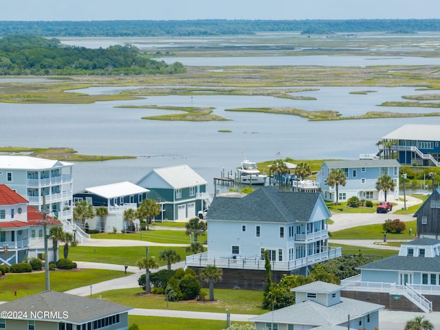 drone / aerial view with a water view