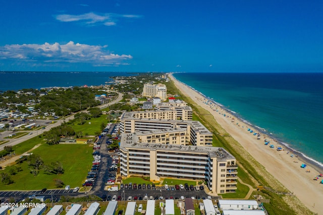 bird's eye view with a view of the beach and a water view