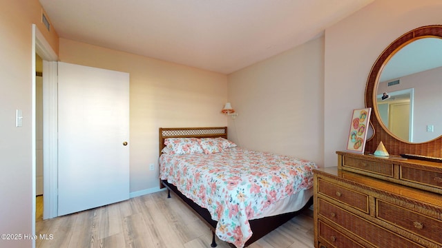 bedroom featuring light hardwood / wood-style flooring