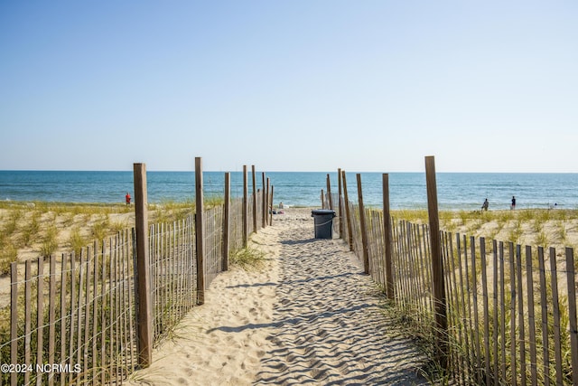 property view of water with a beach view