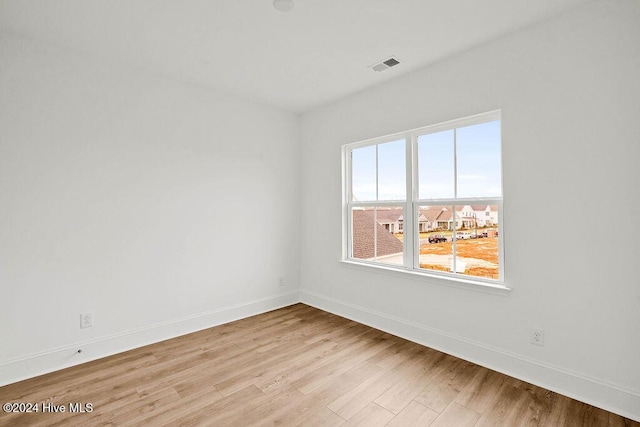 1134 Trisail Ter, Wilmington, NC 28412 - unfurnished room with wood finished floors and baseboards