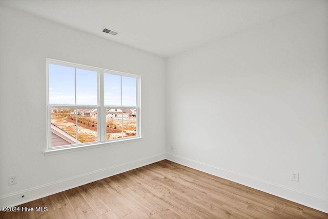 1134 Trisail Ter, Wilmington, NC 28412 - empty room featuring light wood finished floors and baseboards
