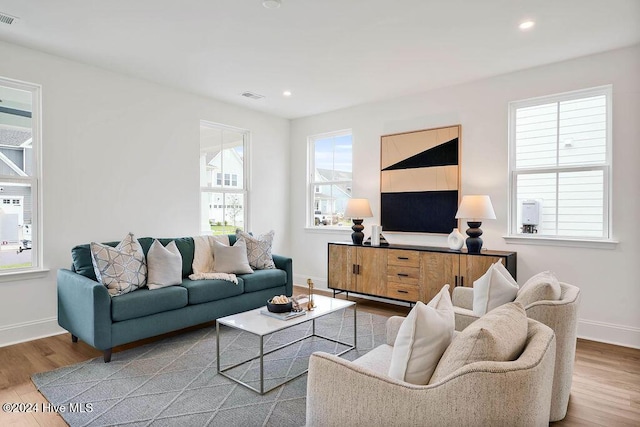 1134 Trisail Ter, Wilmington, NC 28412 - living room with wood finished floors, baseboards, and recessed lighting