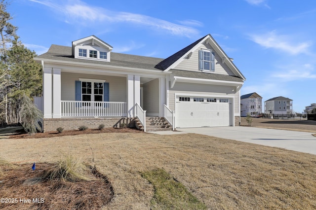 craftsman-style house with covered porch and a front lawn