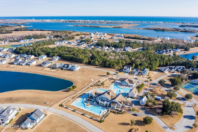 birds eye view of property featuring a water view