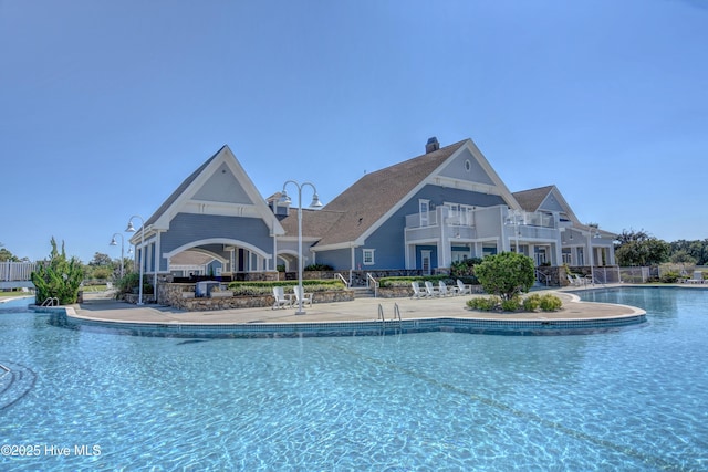 view of swimming pool with a patio area