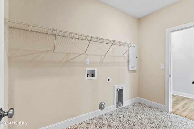 laundry room featuring washer hookup, laundry area, baseboards, and hookup for an electric dryer