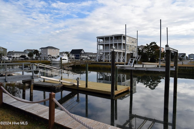 dock area with a water view