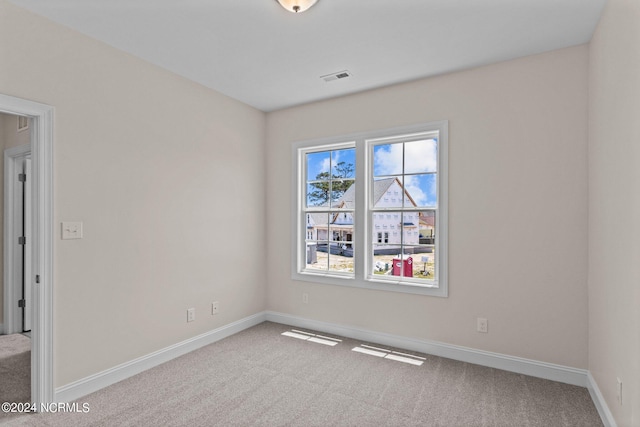 view of carpeted spare room