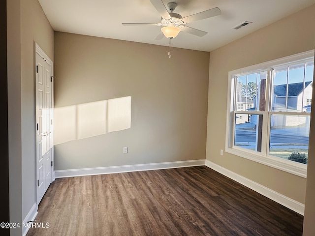 spare room featuring ceiling fan and hardwood / wood-style flooring