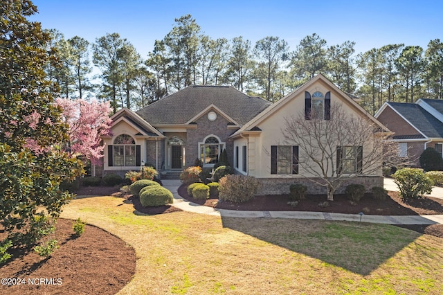 view of front of property with a front lawn