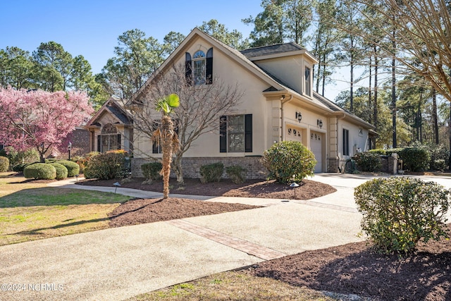 front of property with a garage