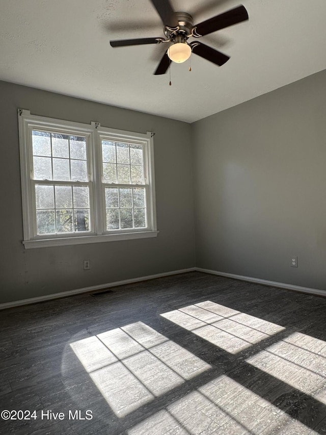 unfurnished room with ceiling fan