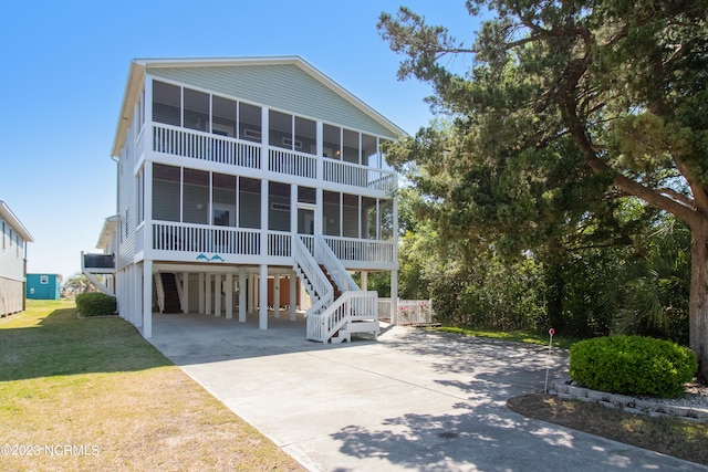 view of front facade with a carport