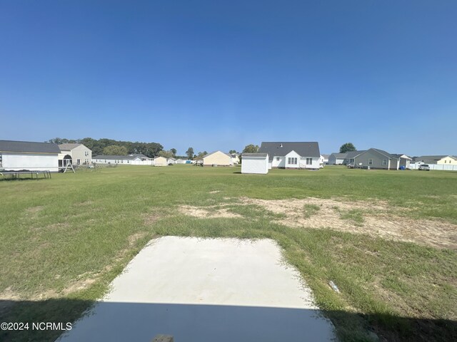 view of yard with a residential view