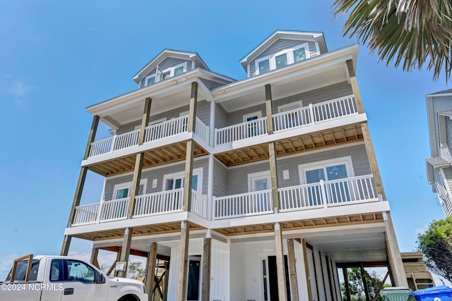 coastal home featuring a carport