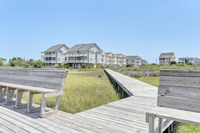 view of dock with a residential view