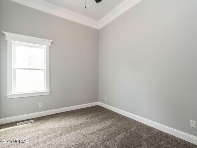 unfurnished room with carpet flooring and ornamental molding