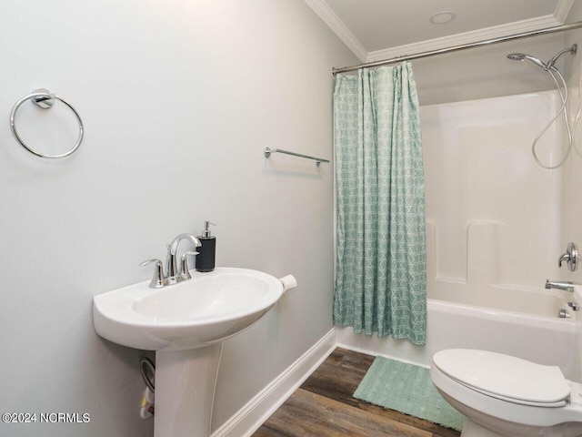 bathroom with hardwood / wood-style floors, shower / bath combination with curtain, toilet, and crown molding