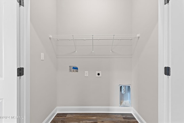 washroom with hookup for an electric dryer, hookup for a washing machine, and dark hardwood / wood-style flooring