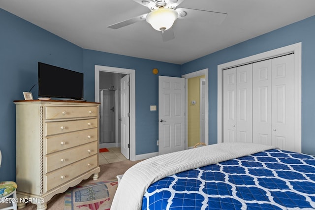 bedroom featuring ceiling fan and a closet