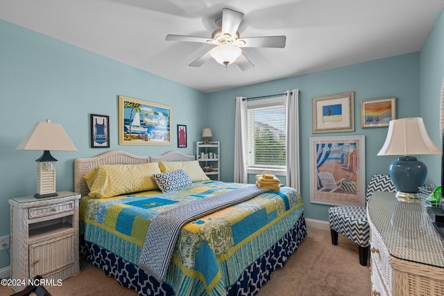 bedroom featuring carpet and ceiling fan