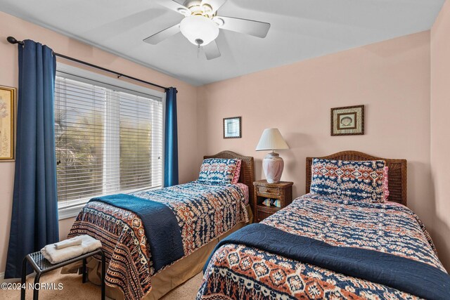 bedroom featuring carpet flooring and ceiling fan