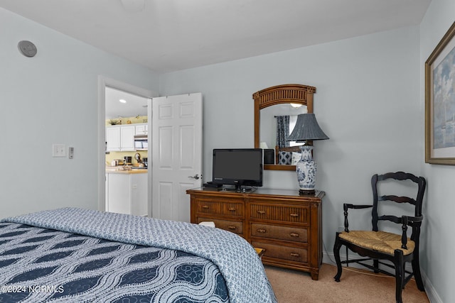 bedroom with light carpet